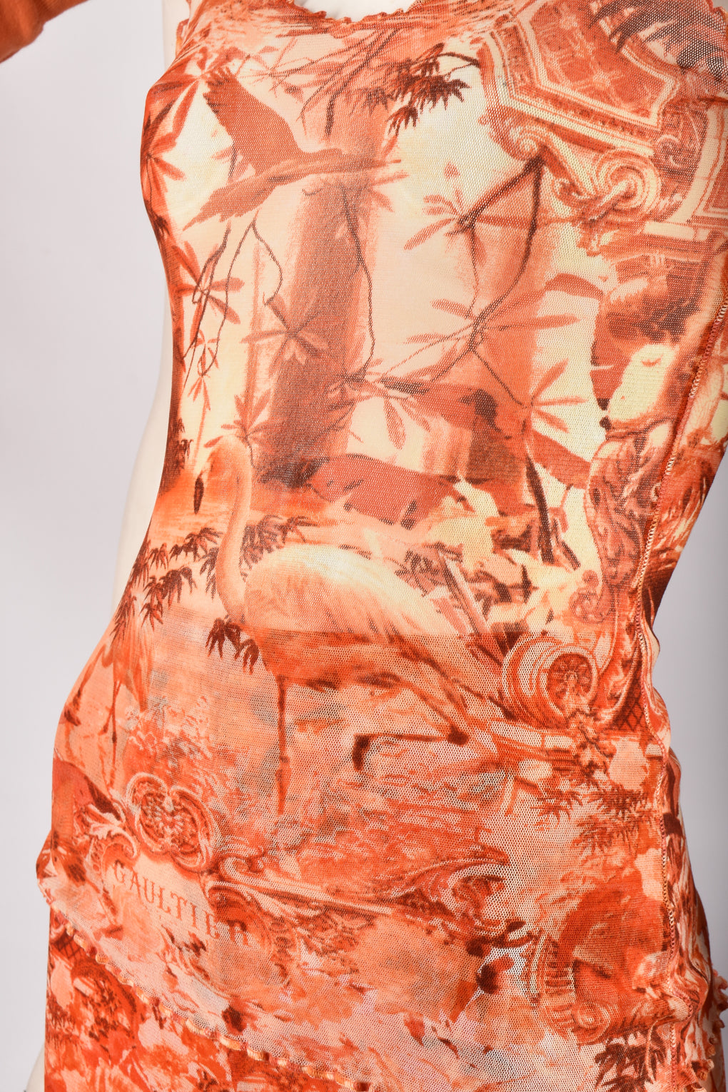 JEAN PAUL GAULTIER ORANGE MESH TOP AND TROUSERS