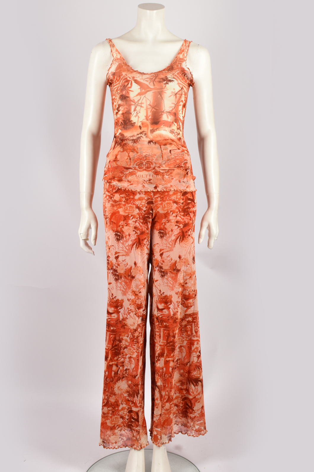 JEAN PAUL GAULTIER ORANGE MESH TOP AND TROUSERS