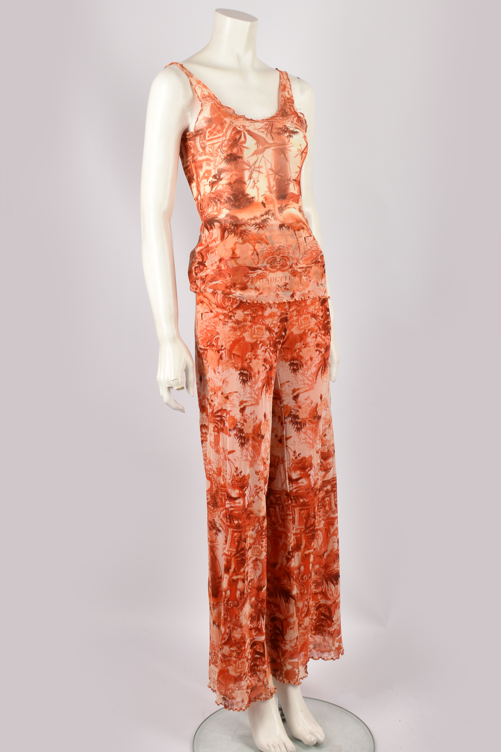 JEAN PAUL GAULTIER ORANGE MESH TOP AND TROUSERS