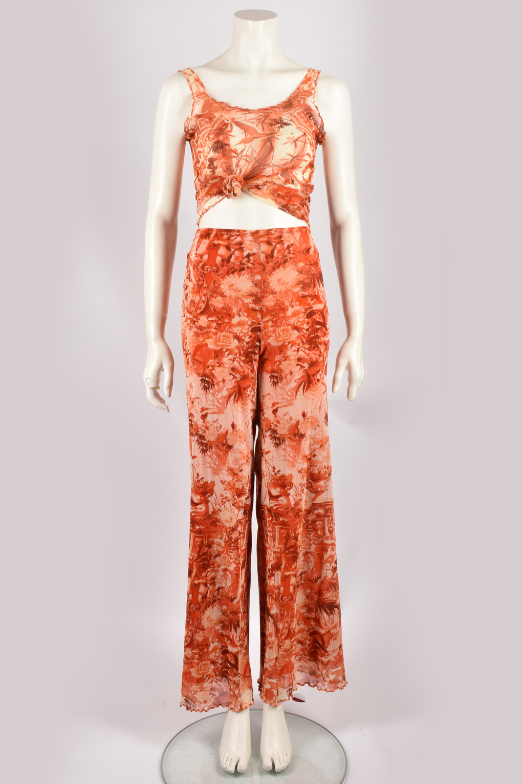 JEAN PAUL GAULTIER ORANGE MESH TOP AND TROUSERS